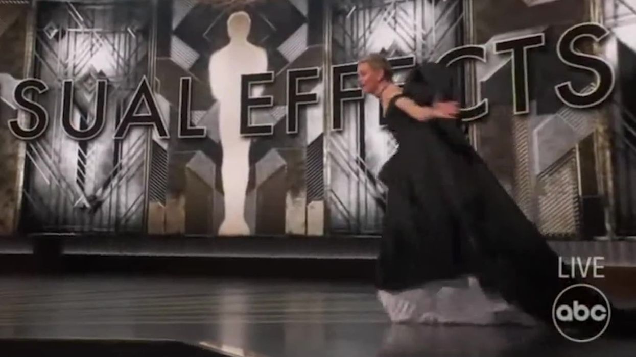 Moment Elizabeth Banks almost takes tumble presenting Oscars award