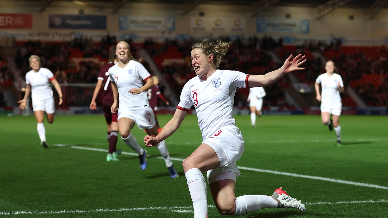 <p>Ellen White celebrates scoring against Latvia</p>