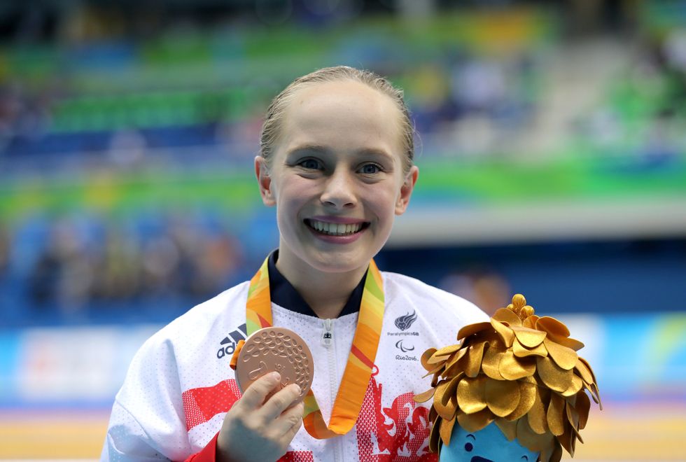 Ellie Robinson with her bronze medal in 2016 at the Rio Paralympics (PA)