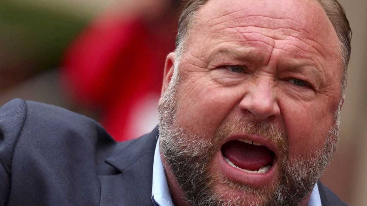 Alex Jones breaks down after claiming that he was 'duped'