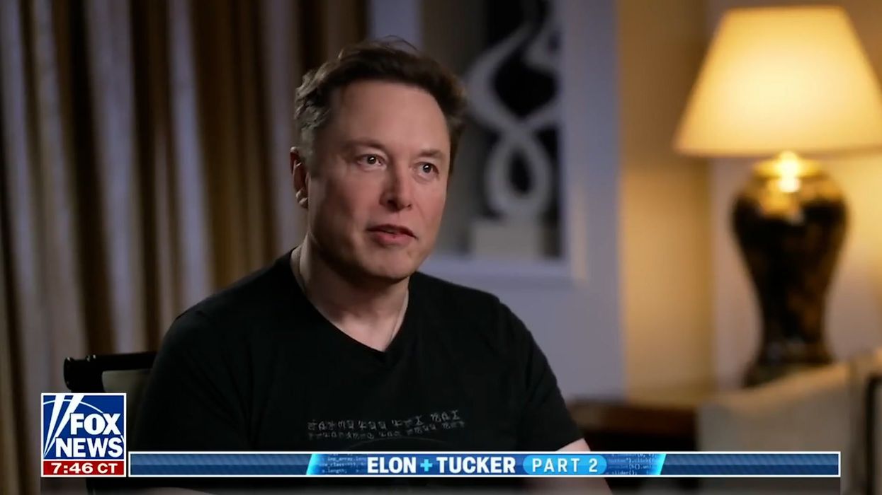 Bizarre photo of 'Elon Musk kissing a robot' goes viral