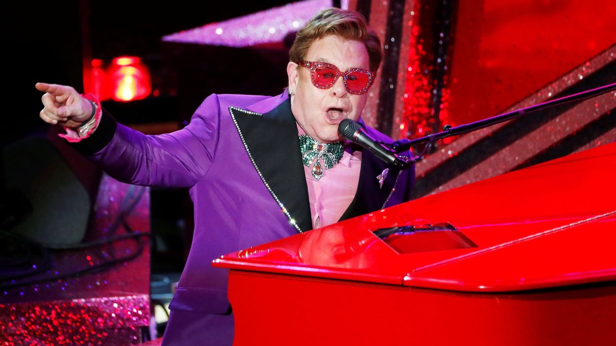 <p>Elton John performing</p>