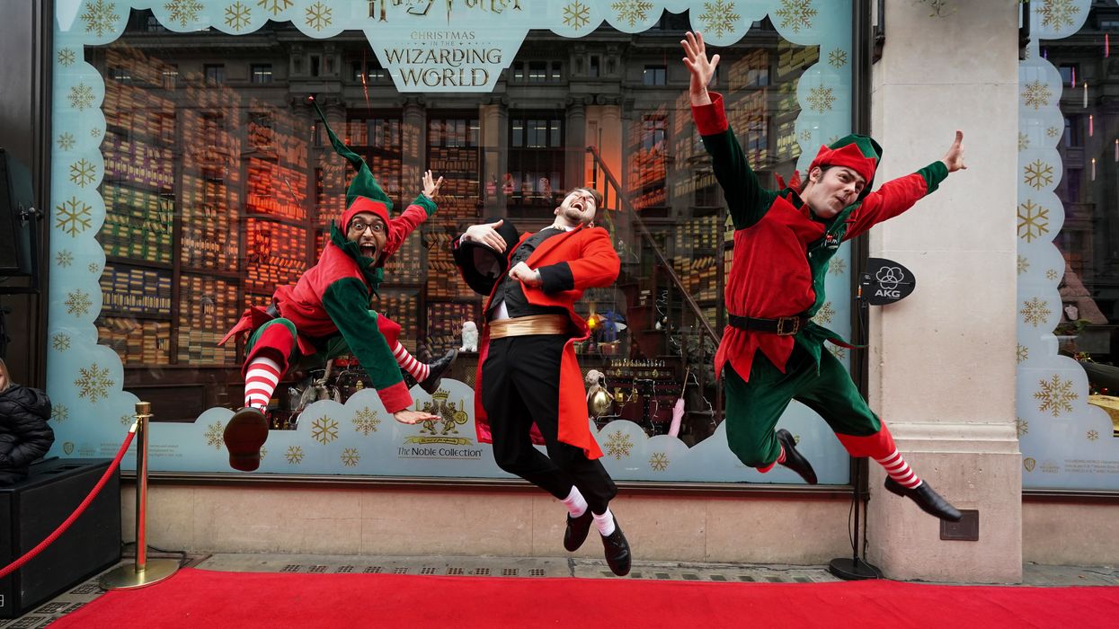 Elves perform during the unveiling of Hamleys’ Christmas windows (Kirsty O’Connor/PA)