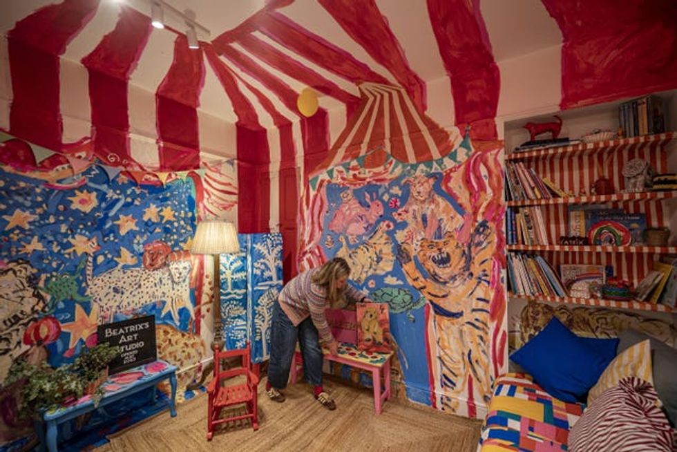Emily Powell tidies in her daughter\u2019s circus-themed playroom