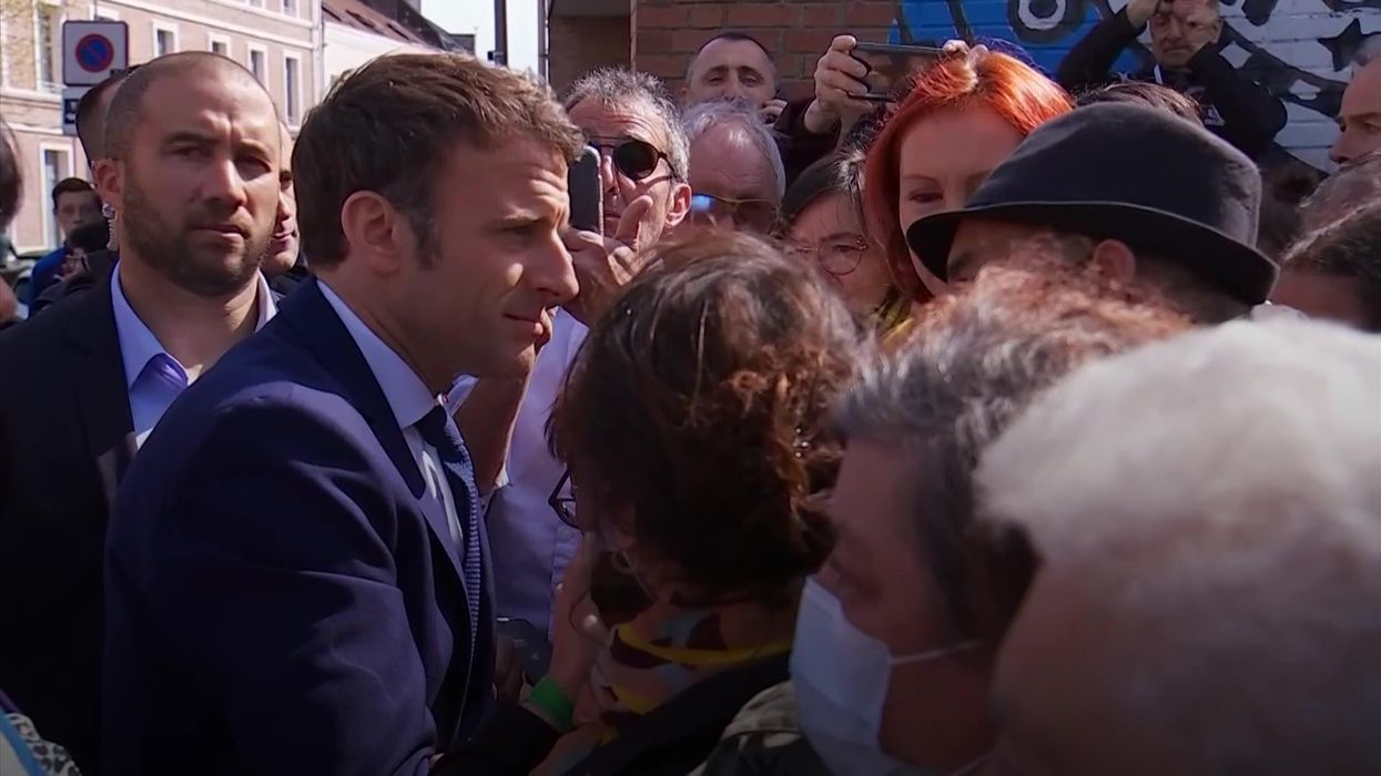 Twitter swoons over 'thirst trap' pic of Emmanuel Macron with open shirt on sofa