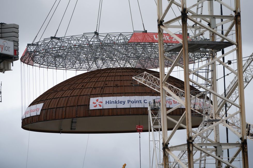 World’s largest crane ‘Big Carl’ lifts reactor dome into place at Hinkley Point C