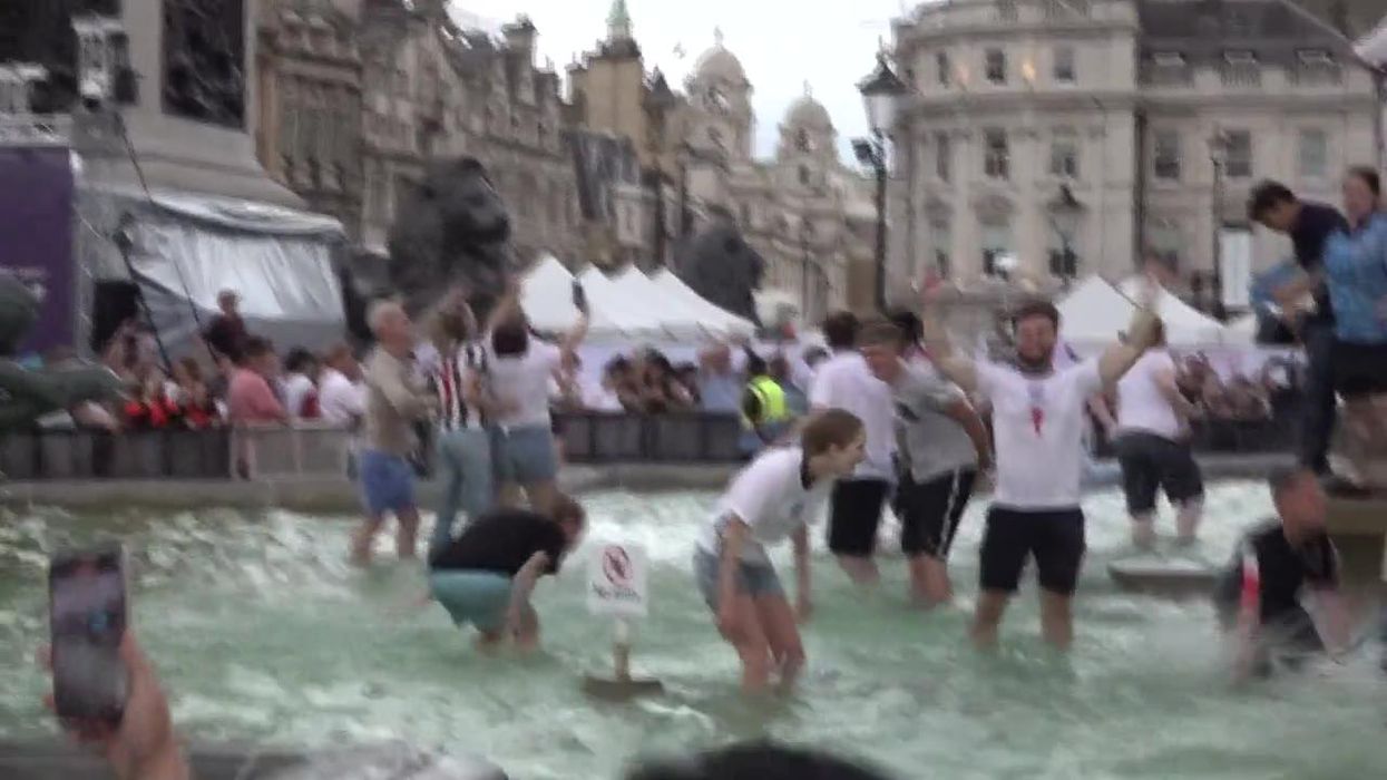 England fans celebrate Women's Euros 2022 win in Trafalgar Square fountains