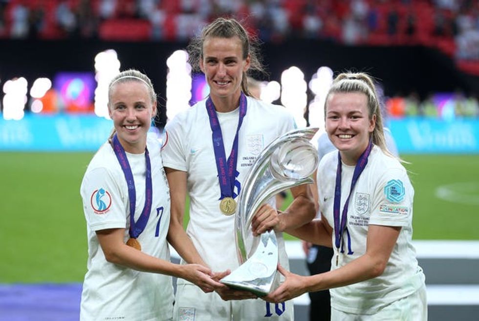England\u2019s Lauren Hemp (left), Jill Scott (centre) and Beth Mead celebrate with the trophy after England win the UEFA Women\u2019s Euro 2022 final at Wembley Stadium, London. Picture date: Sunday July 31, 2022