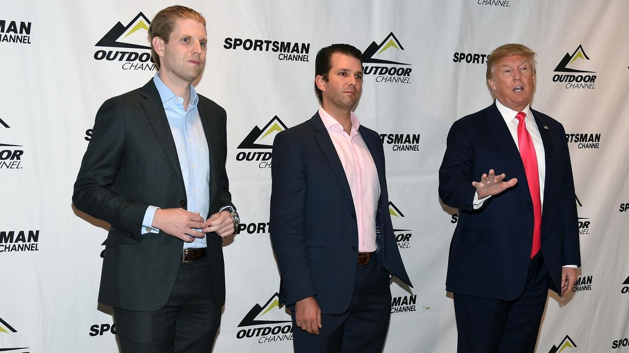 Eric Trump, Donald Trump Jr. and their father, Donald Trump, speak at a news conference before the Outdoor Channel and Sportsman Channel's 16th annual Outdoor Sportsman Awards in Las Vegas 21 January 2016.