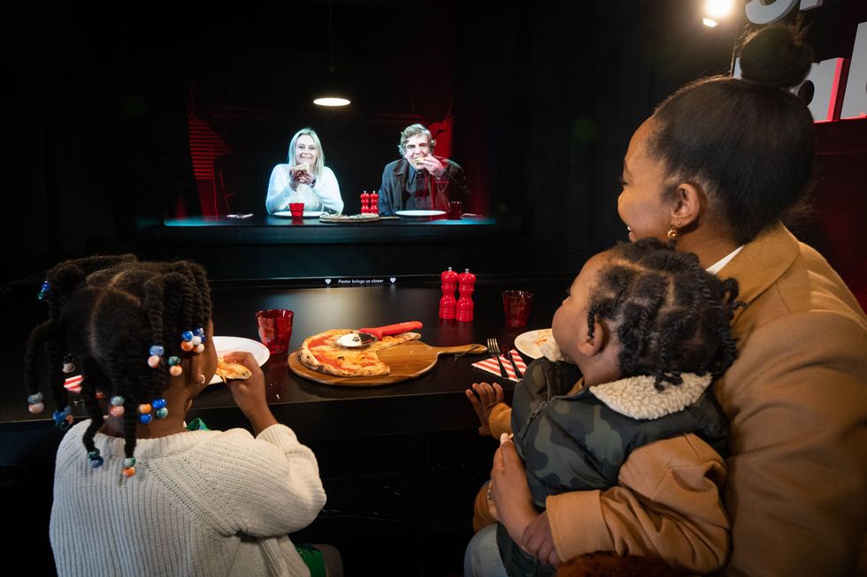 Families in London and Edinburgh were able to see one and other in life-size 3D using holographic technology