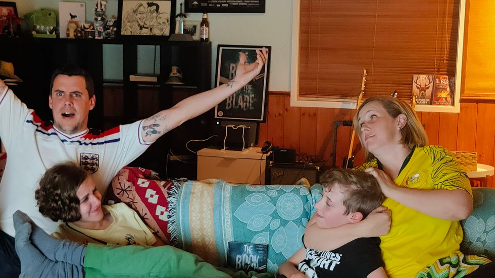 Family of four sat on the sofa