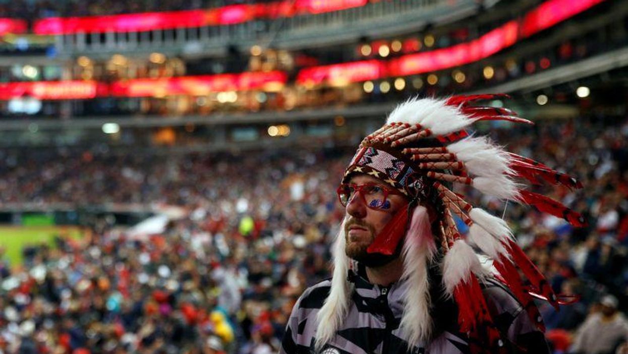 Cleveland Indians Fan In Redface Meets A Native American 