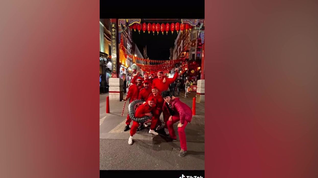 Formula 1-themed fancy dress group hilariously 'change tyres' on London cars