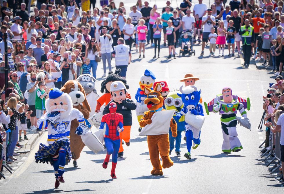 Fancy dress was on show for the mascot race (Jane Barlow/PA)