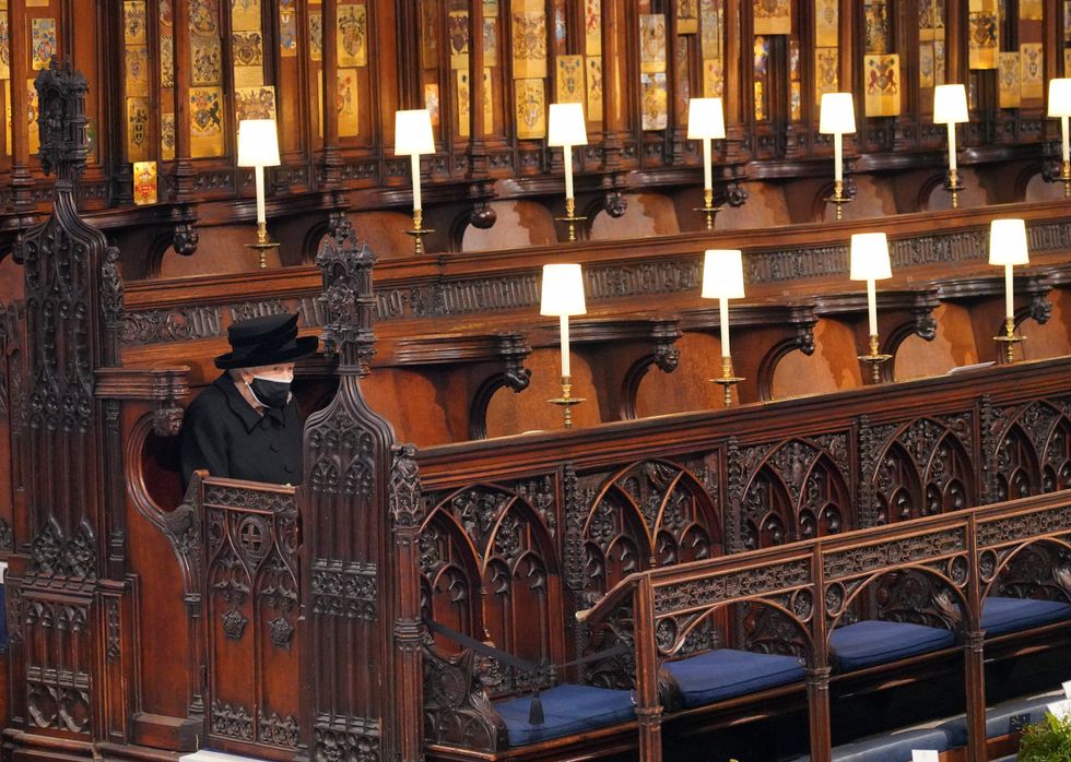 File photo dated 17/04/21 of Queen Elizabeth II after taking her seat for the funeral of her husband, the Duke of Edinburgh, in St George\u2019s Chapel, Windsor Castle, Berkshire (Jonathan Brady/PA)
