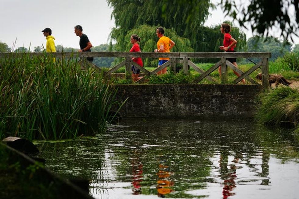 File photo of runners at Bushy parkrun. (Victoria Jones/ PA)