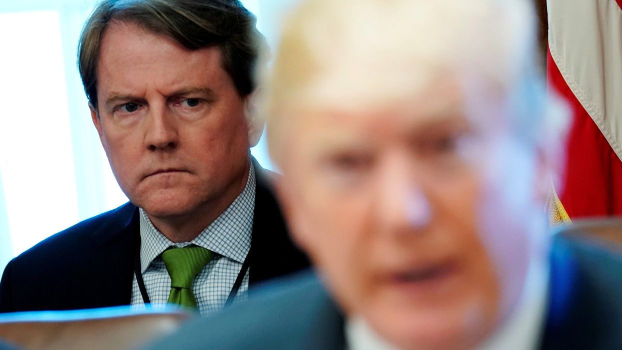 FILE PHOTO: White House Counsel McGahn listens to U.S. President Trump hold a cabinet meeting at the White House in Washington
