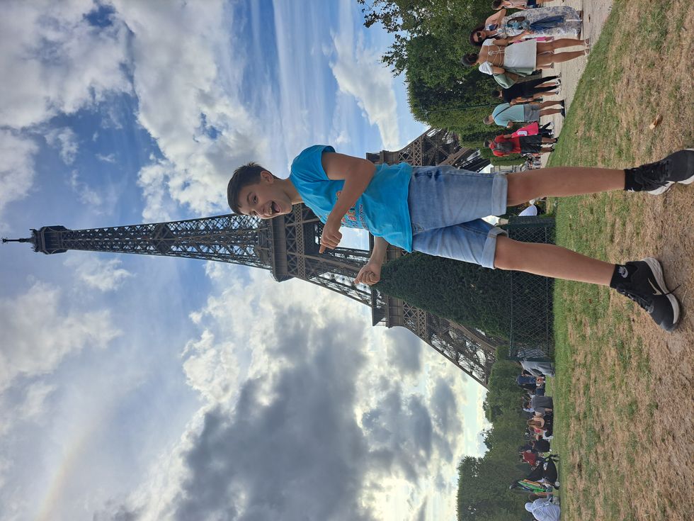 Teen who recovered from broken back completes charity Eiffel Tower climb
