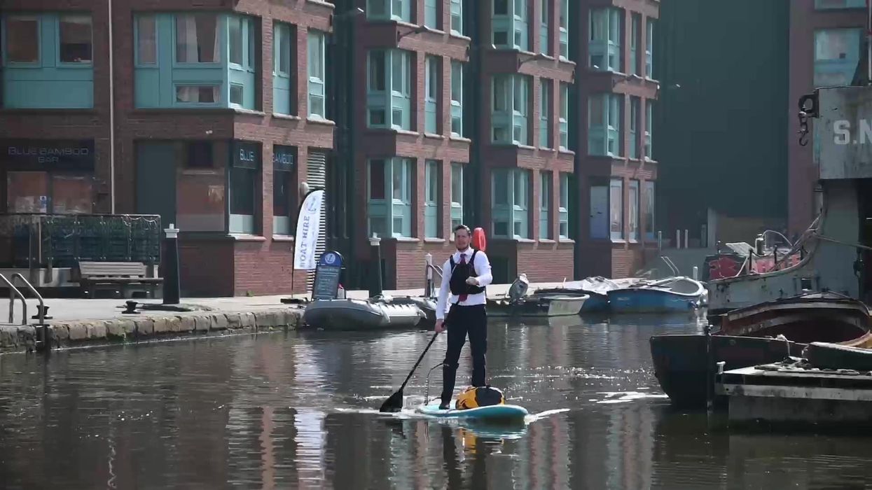 Guy paddleboards to work and saves £2,500 a year in petrol and parking costs