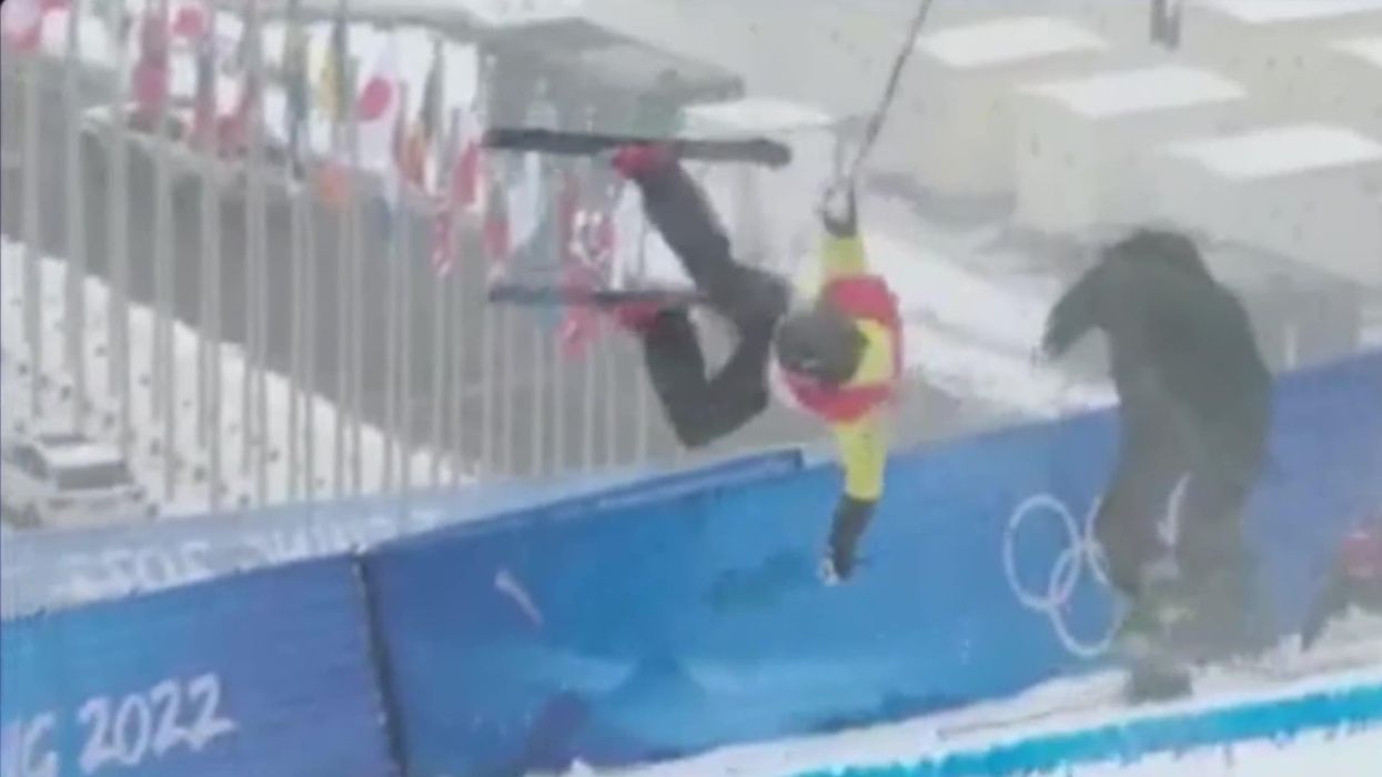 Olympic skier smashed into cameraman and ends up in crumpled ball, then says: 'Owie'