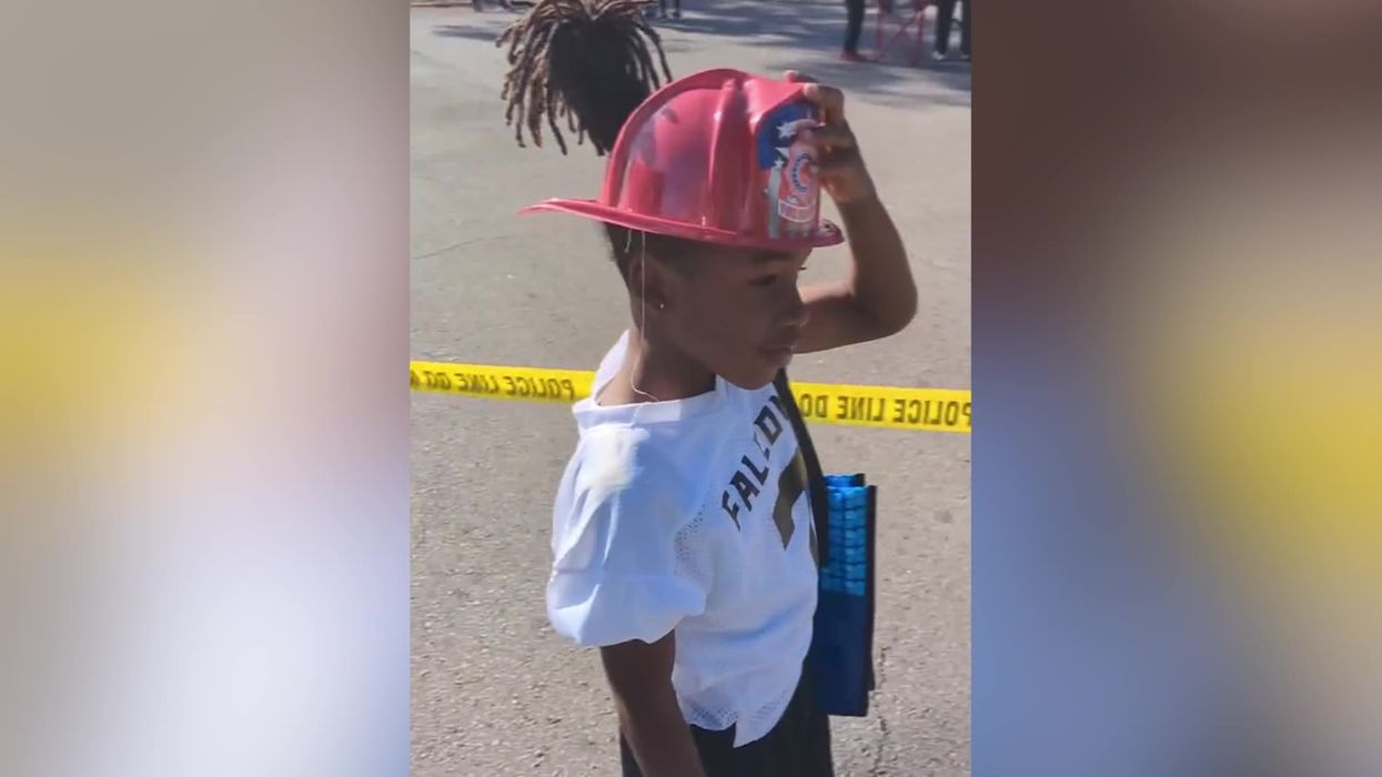 Firefighter's sweet gesture to young boy who wanted to wear helmet goes viral