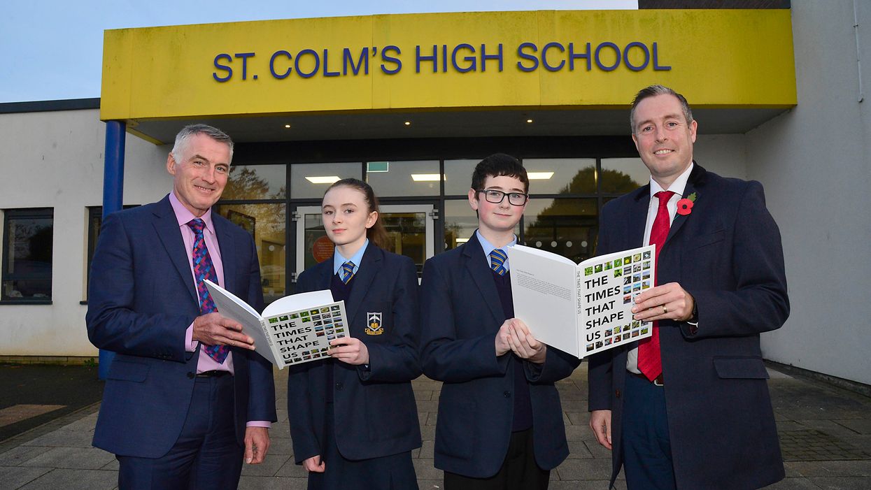 First Minister Paul Givan and Junior Minister Declan Kearney met with students from St Colm’s to pay tribute to their work and the publication of The Times That Shape Us anthology (Arts Council NI/PA)