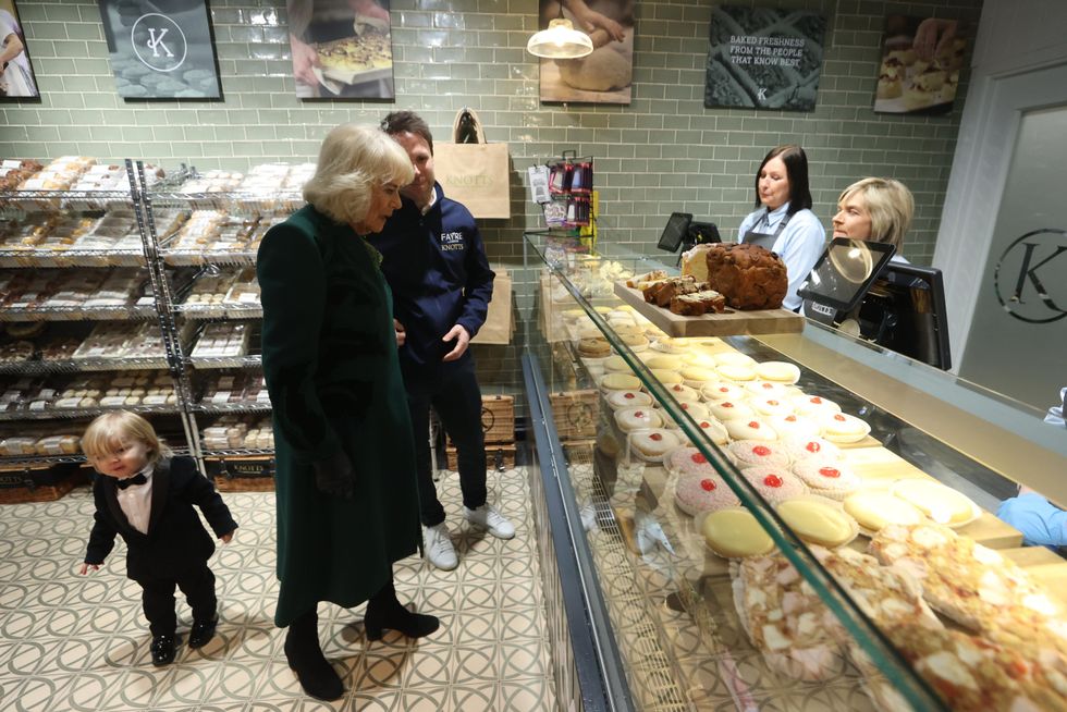 Belfast boy ‘steals the show’ as Queen visits local bakery