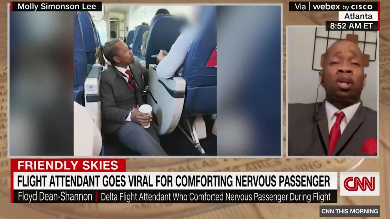 Flight attendant goes viral for comforting a nervous passenger on a flight