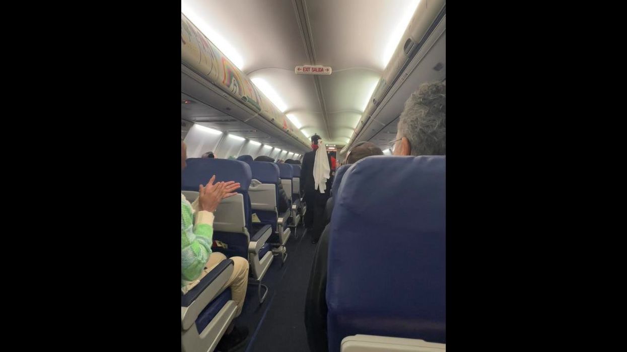 Passenger forced to stare out plane window after man invades her personal space