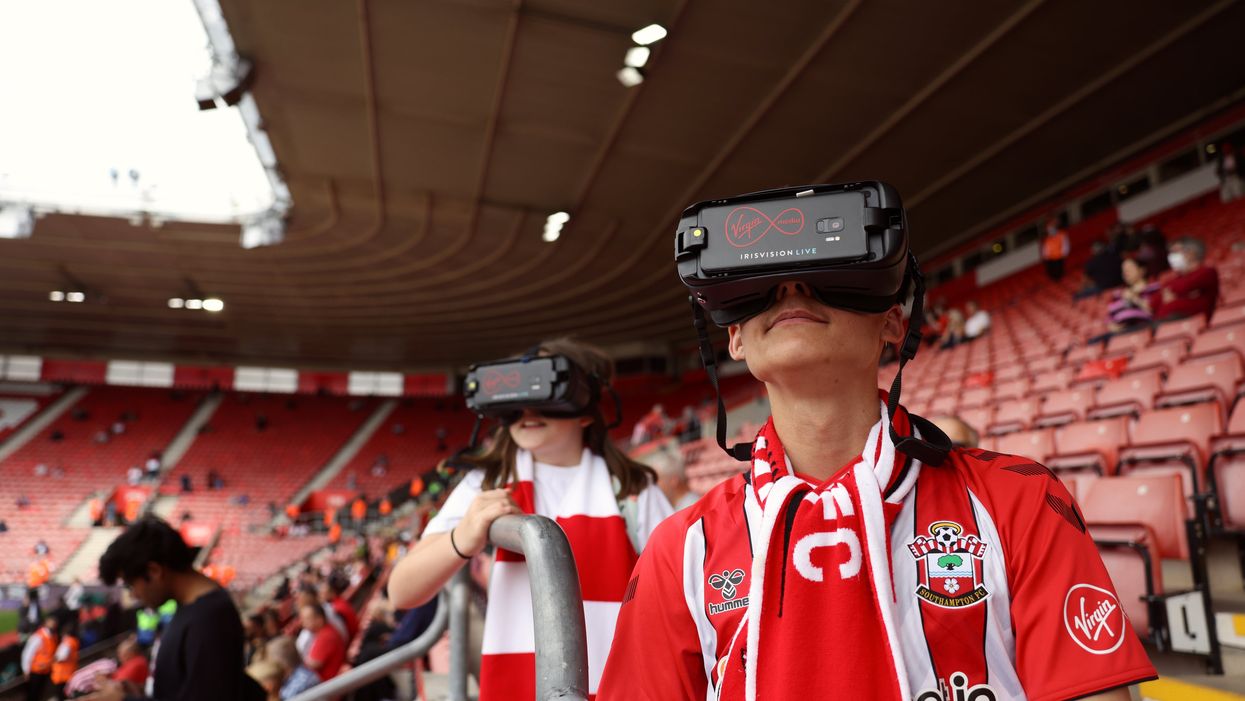Florence and Joshua wearing IrisVision glasses at a Southampton game (Virgin Media/PA)