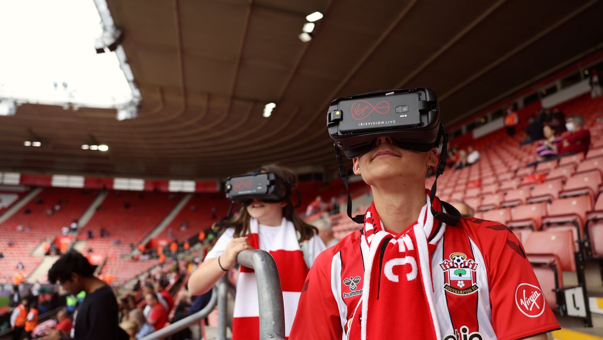 Florence and Joshua wearing IrisVision glasses at a Southampton game (Virgin Media/PA)