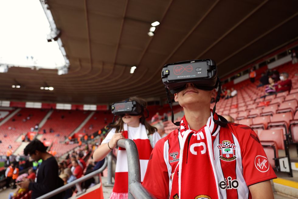Florence and Joshua wearing IrisVision glasses at a Southampton game (Virgin Media/PA)