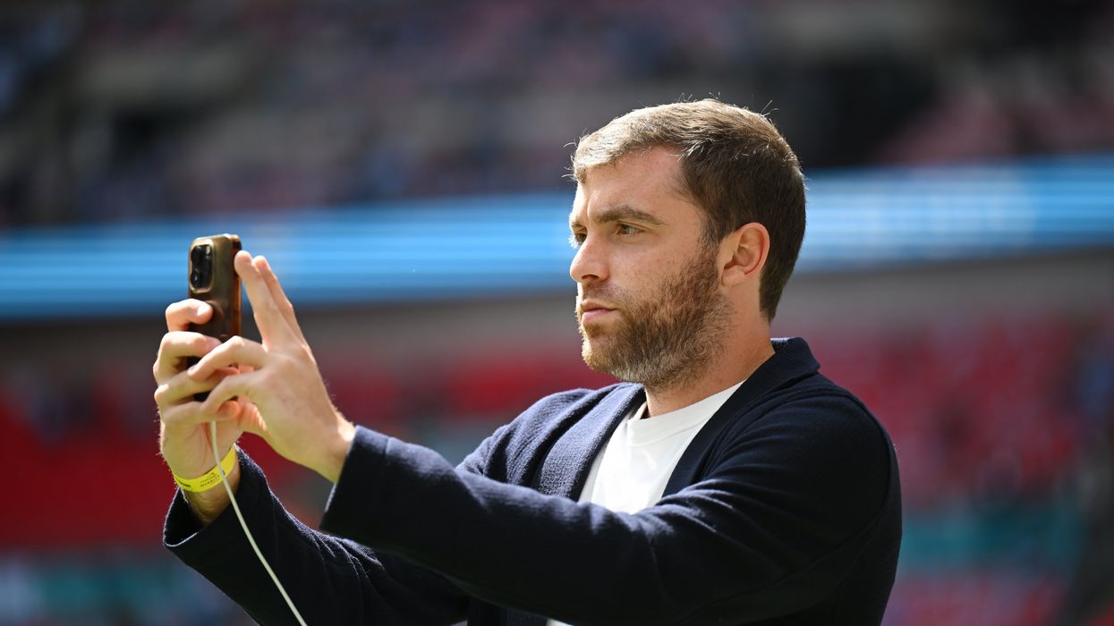 Football journalist Fabrizio Romano looks on during the Emirates FA Cup Final match between Manchester City and Manchester United at Wembley Stadium on May 25, 2024 in London, England