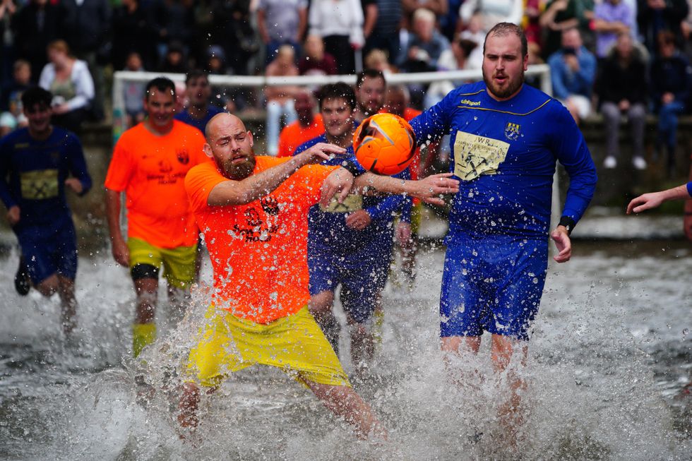 Annual river football match continues to excite crowds in Cotswold village