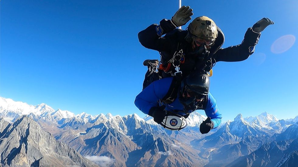 Video: Former rugby player completes 24,000ft skydive clutching rugby ball