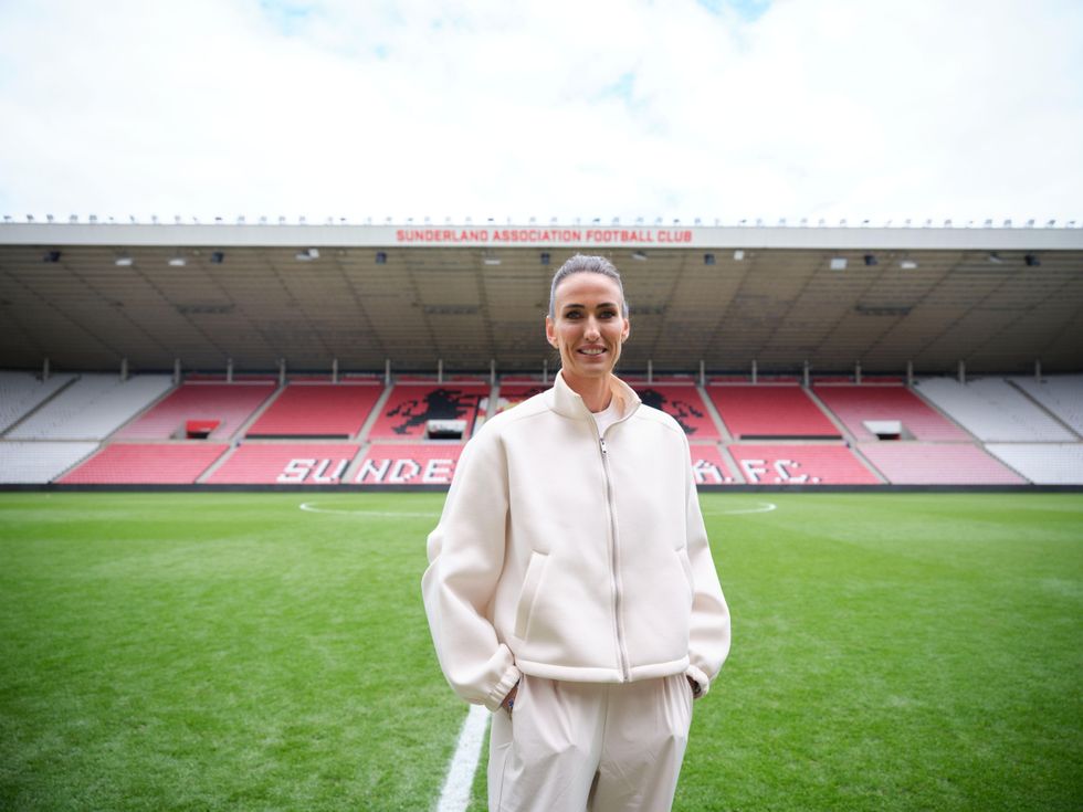 Former Lioness Jill Scott at the Stadium of Light in a white outfit