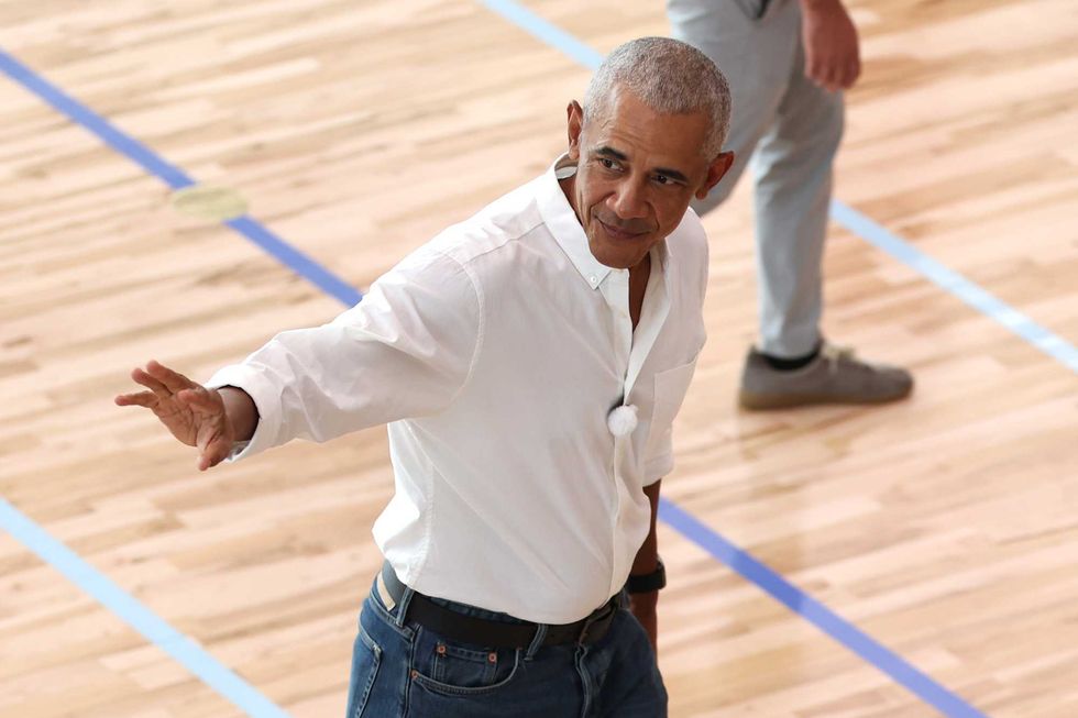 Former U.S. President Barack Obama waves to players at Obama Presidential Center on July 24, 2026 in Chicago, Illinois