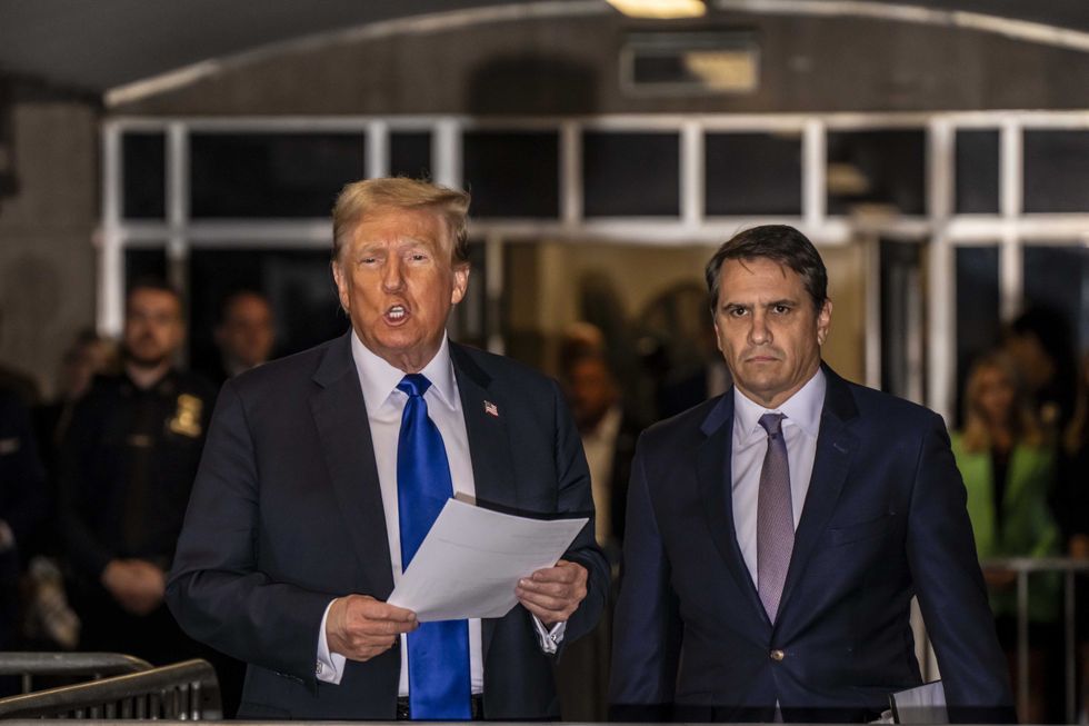 Former U.S. President Donald Trump with attorney Todd Blanche speaks to the media at his criminal trial at Manhattan Criminal Court on May 30, 2024 in New York City