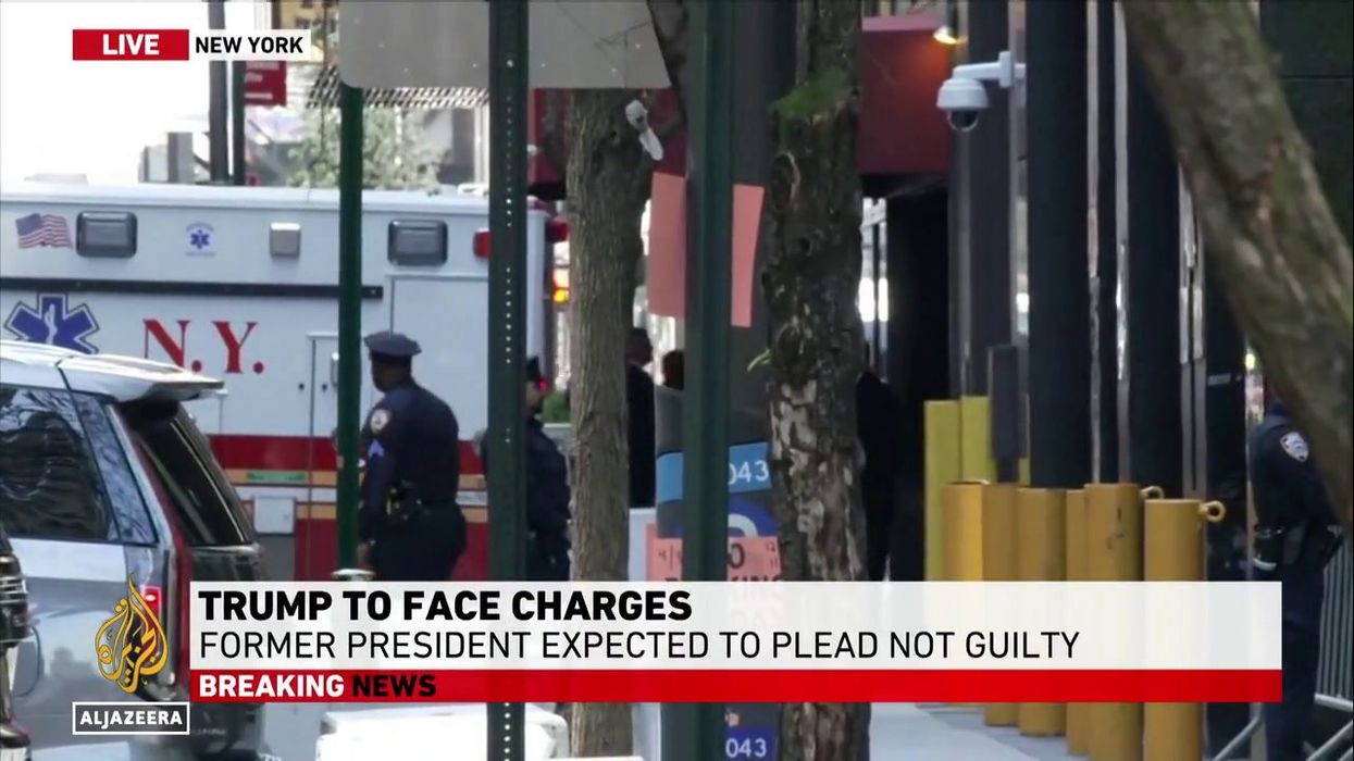 Trump sells fake mugshot on t-shirt to drum up donations after arrest