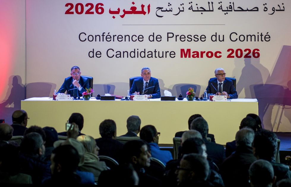 Fouzi Lekjaa (L), President of the Royal Moroccan Football Federation (FRMF), Moulay Hafid Elalamy (C), chairman of the Moroccan Committee bidding for the 2026 World Cup, and Moroccan Youth and Sport Minister Rachid Talbi Alami (R) give a press conference in Casablanca on 23 January 2018, presenting their country's pitch to host the 2026 competition.