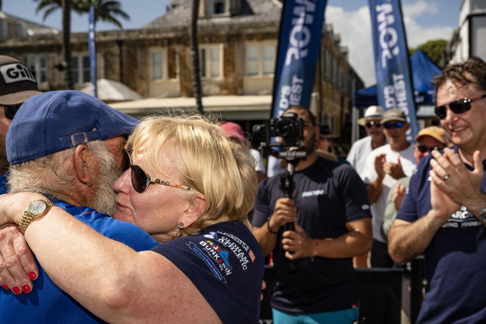 Frank and Judith Rothwell hugging after he completed the challenge