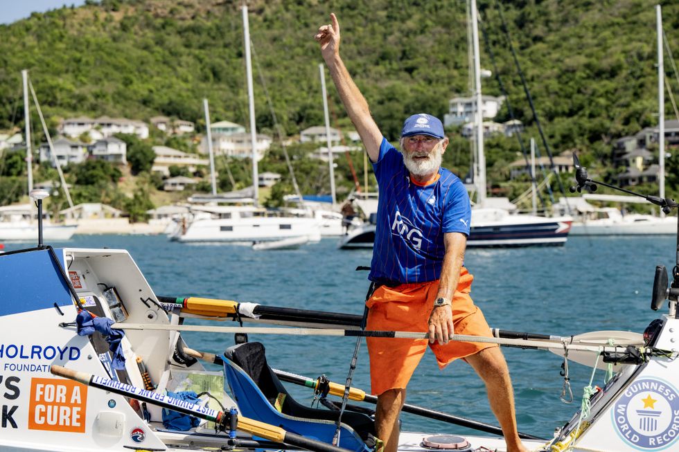 Oldest man to row Atlantic solo reunites with wife after beating own record