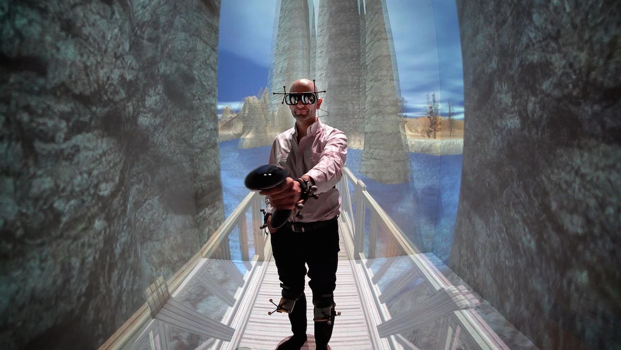 French patient Denis Duet wearing a virtual reality headset undergoes a VR therapy session
