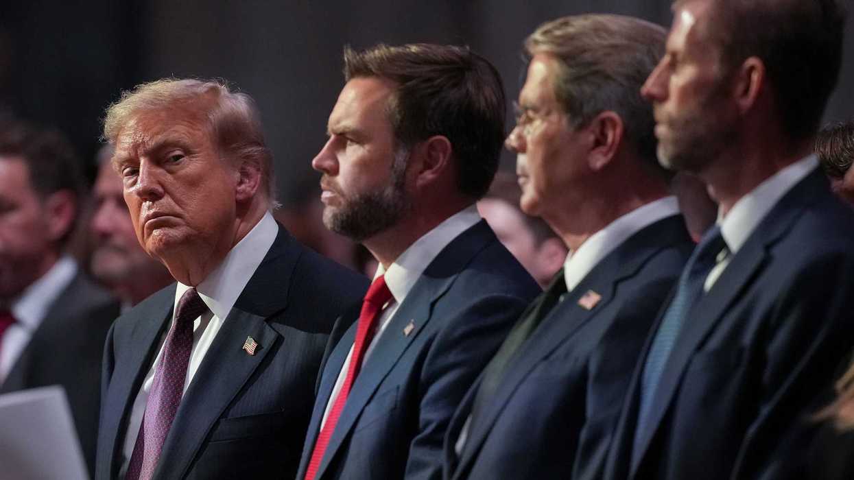 From left: Donald Trump, JD Vance, Scott Bessent and Eric Trump. They are all standing during a funeral.