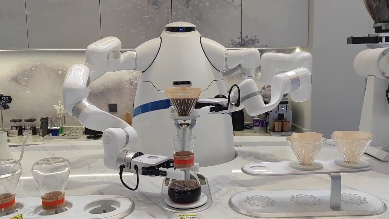 Fully automatic robot barista serves customers during the Beijing Winter Olympics