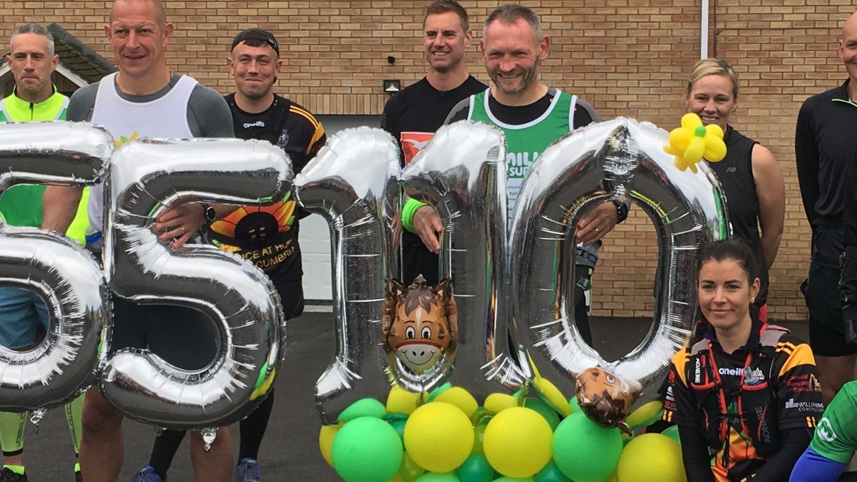 Fundraiser Gary McKee with supporters before setting off on the final marathon of his 110-day challenge
