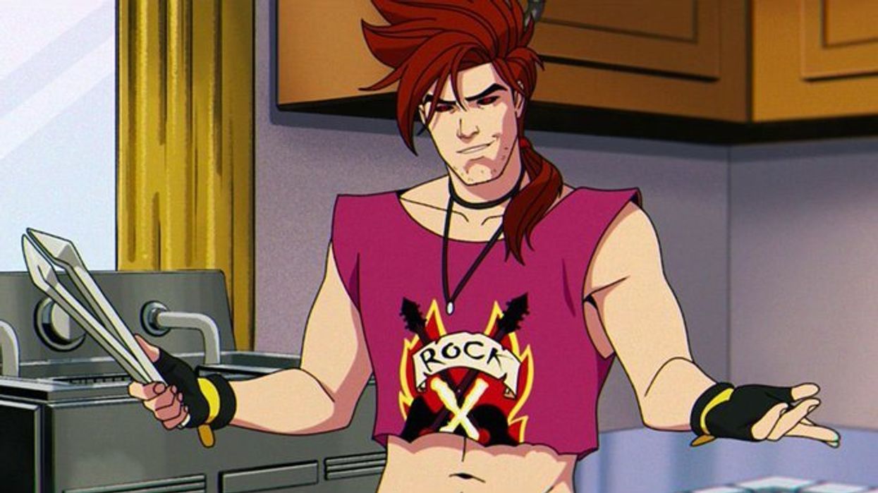 Gambit wearing a burgundy crop top that says 'rock'