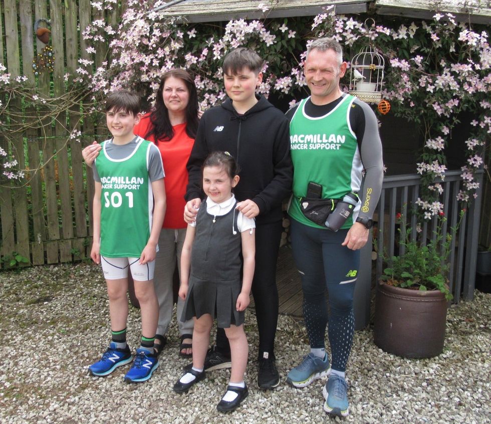 Gary McKee (right) with wife Sue and children children Alfie, 16, Beau 13, and Minnie, nine (Macmillan Cancer Support/PA)