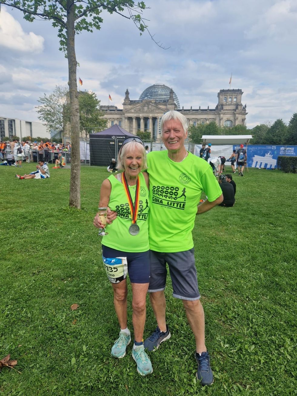Gina Little with husband Ray after finishing the Berlin Marathon on Sunday