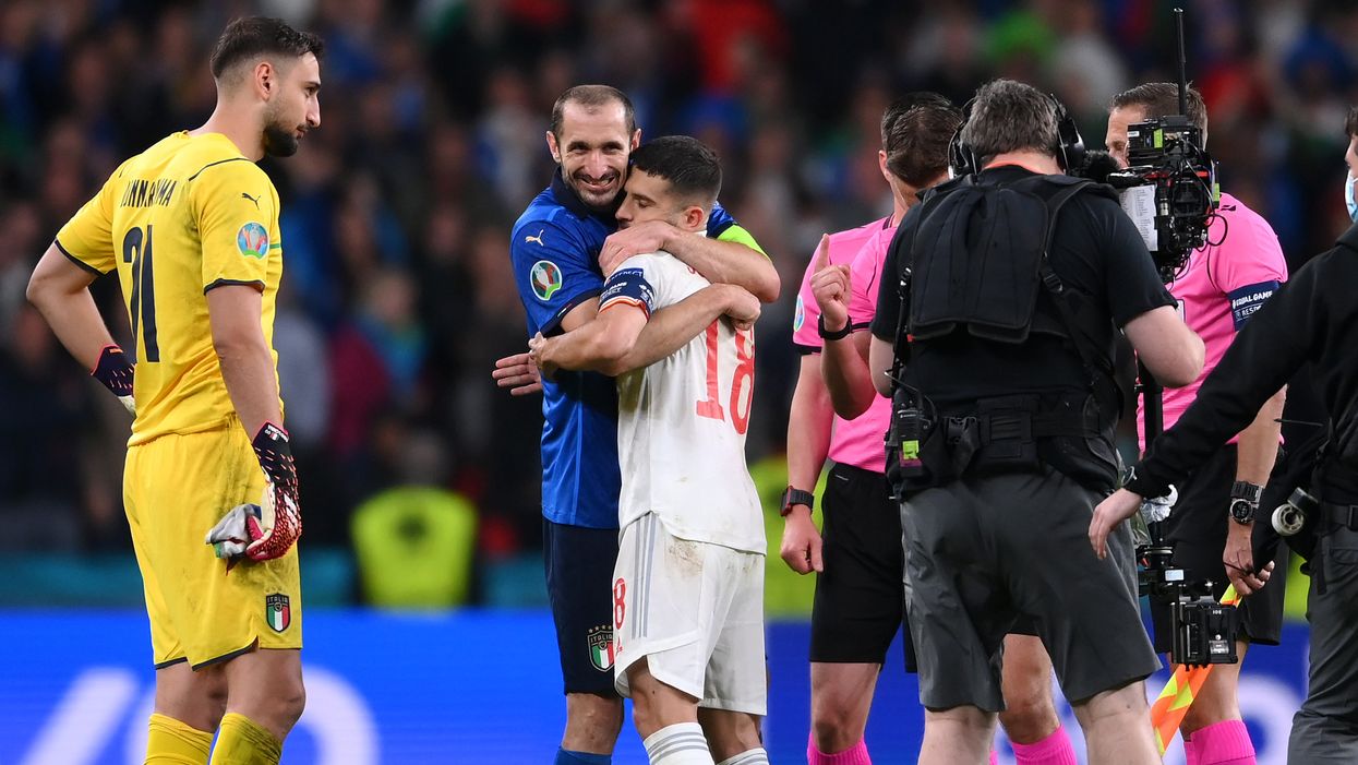 <p>Giorgio Chiellini of Italy interacts with Jordi Alba of Spain during the penalty shoot out coin toss during the UEFA Euro 2020 Championship Semi-final match between Italy and Spain at Wembley Stadium on July 06, 2021 in London, England. </p>